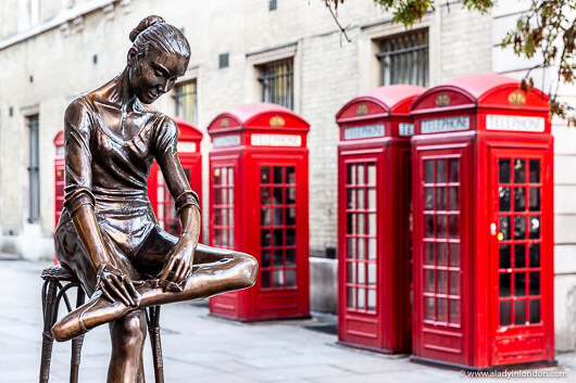 Ballerina Sculpture and Red Phone Boxes in Covent Garden