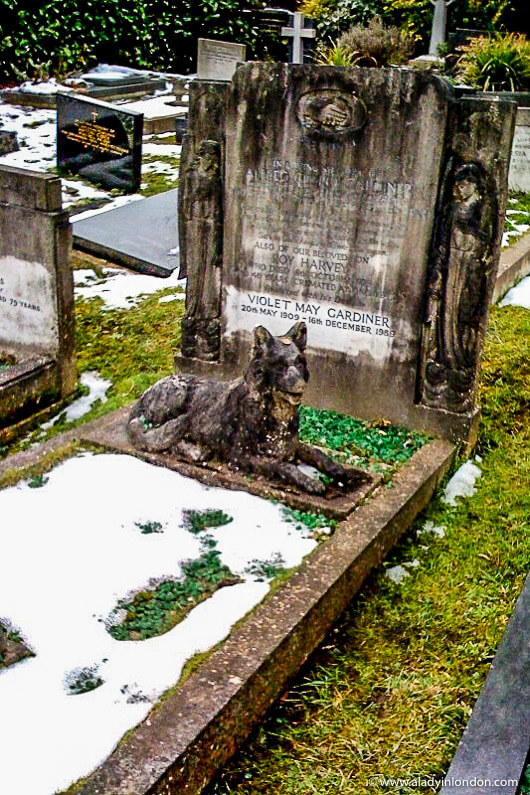 Tombstone with a Dog on it in Highgate Cemetery