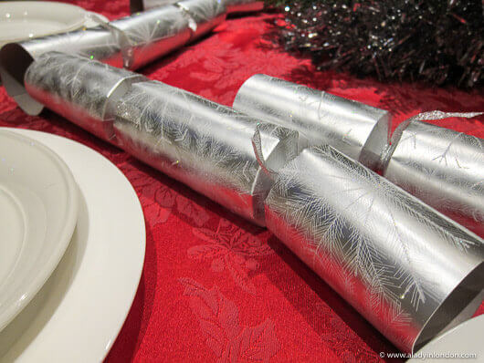 Christmas Crackers on the table at a Christmas dinner in London