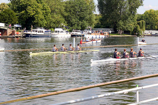 Rowers on the river at the Henley Royal Regatta as seen from the Stewards Enclosure