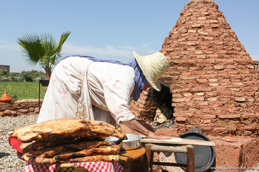 Woman Baking Bread at Le Paradis du Safran in the Ourika Valley