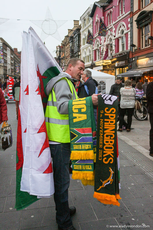 Man Selling Rugby Scarves in Cardiff, Wales