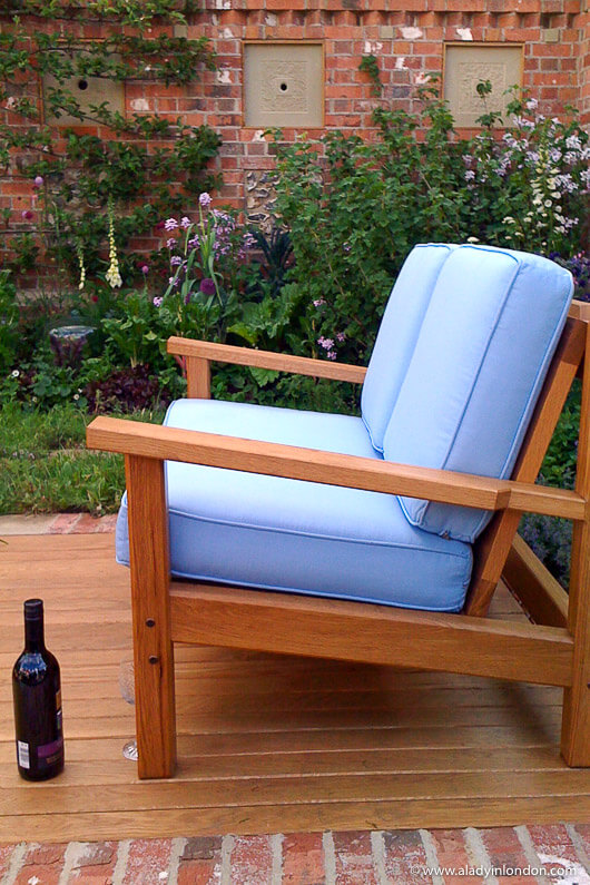 Blue cushions on a sofa at the Chelsea Flower Show in London