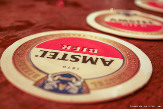 Amstel beer coasters in a bar in Amsterdam, Netherlands