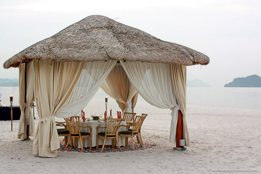 Dining on the beach at the Four Seasons Langkawi