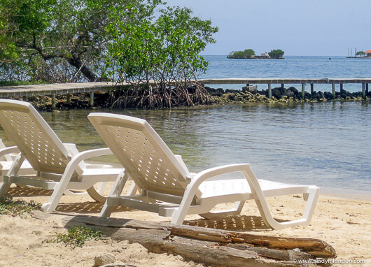 Lounge chairs on the beach on an island in the Islas del Rosario in Colombia