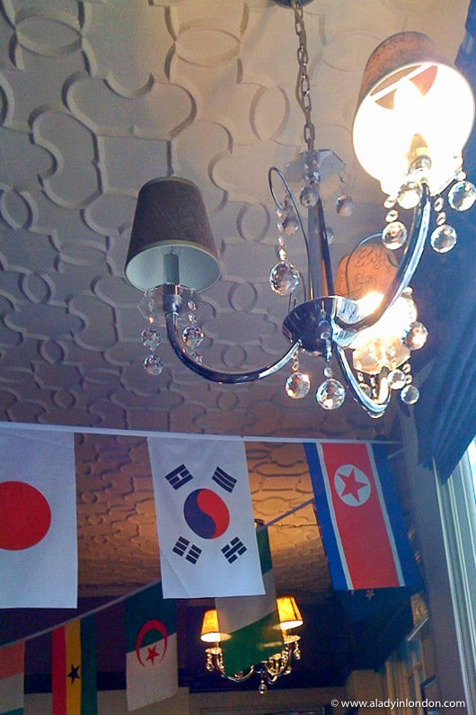 Flags in the King William IV pub in Hampstead, London during the World Cup