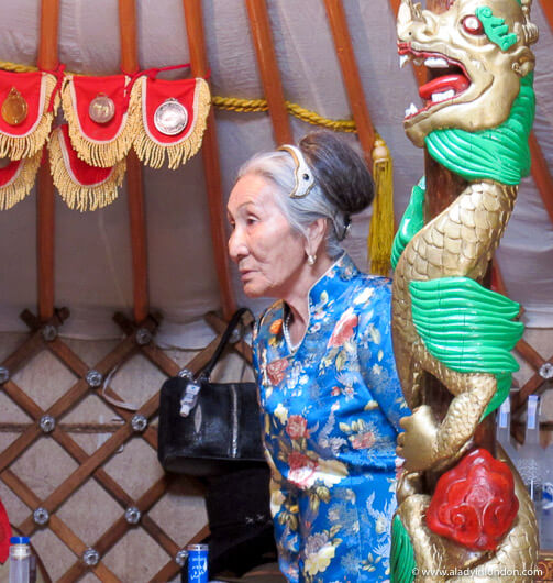 Old Mongolian woman in a ger at the Naadam Festival in Mongolia