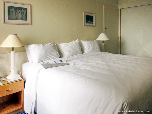 Hotel room bed at the Pullman Paris Montparnasse