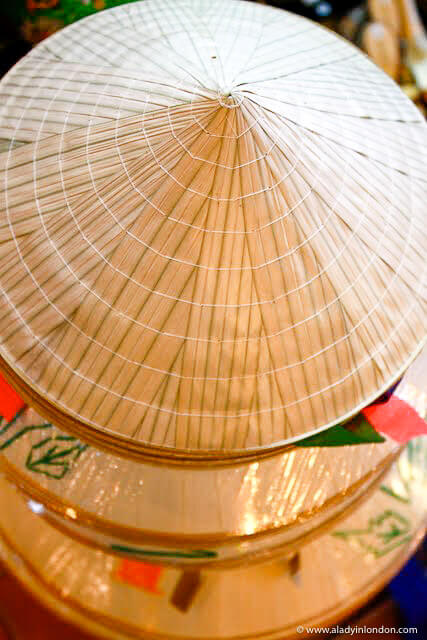 Traditional Vietnamese straw hats at a market in Ho Chi Minh City