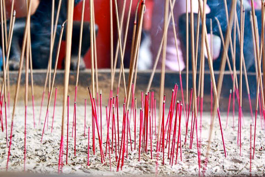 Incense burning at the Buddha Tooth Relic Temple in Singapore