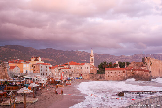 Beach by the old town in Budva, Montenegro at sunset