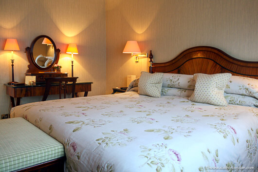 Bed in a suite at The Capital Hotel in London