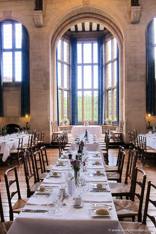 Dining tables at Rhodes House set for a wedding in Oxford, England