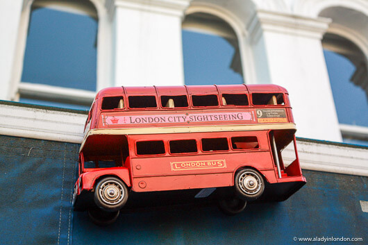 Red bus magnet at Portobello Market in London