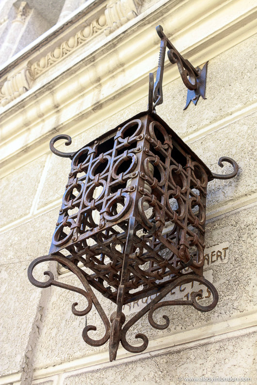 Lantern on a wall in Santiago, Chile