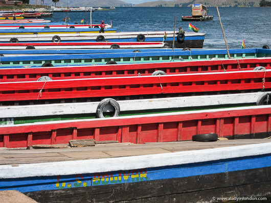Boats at the river crossing on the way from Copacabana to La Paz, Bolivia