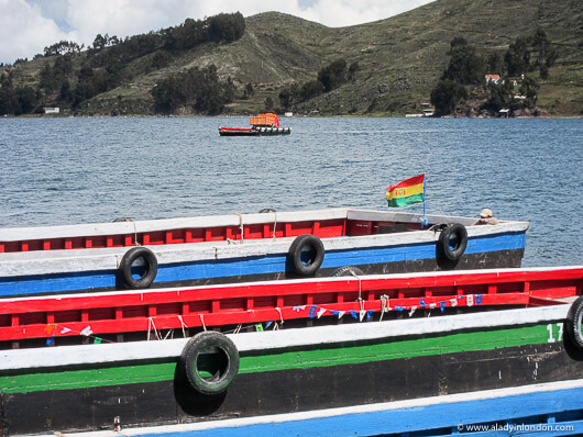 Truck on a ferry across the river en route from Copacabana to La Paz in Bolivia