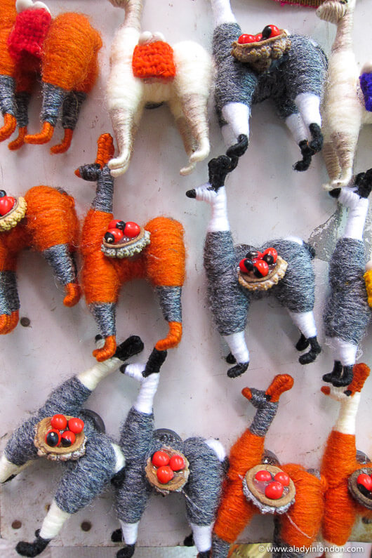 Tiny llama souvenirs for sale at a market in Machu Picchu town, Peru