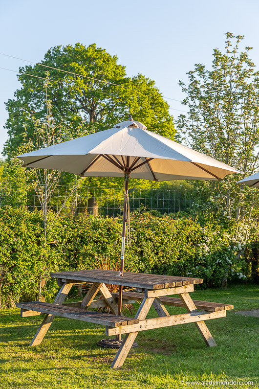 Picnic table in a country pub beer garden in West Sussex, England