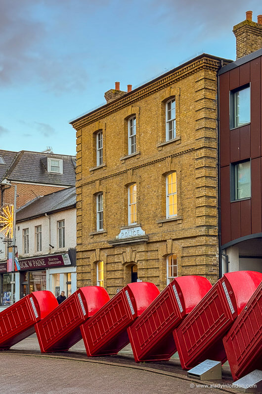 Red phone box sculpture in Kingston
